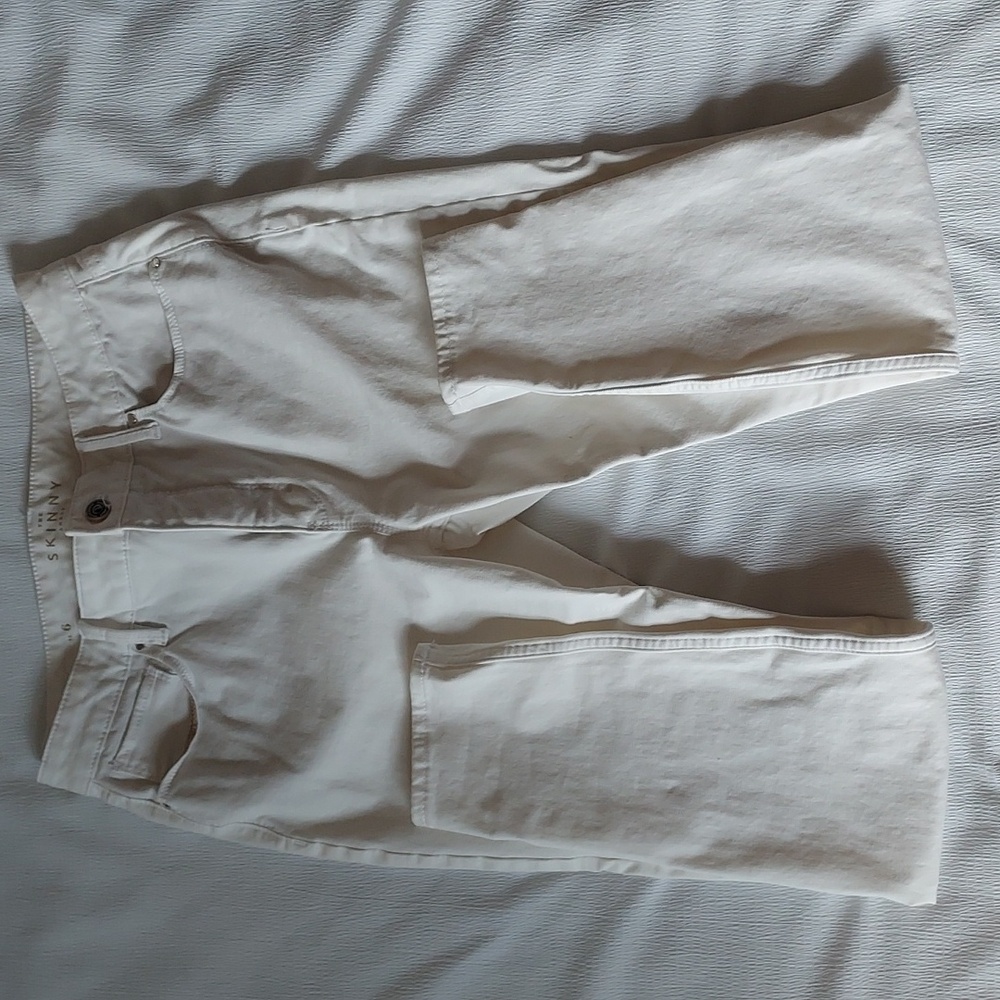 White House Black Market High Rise Skinny (the ankle) jeans.